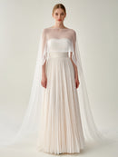 Elegant White Pleated Gown With Sheer Cape Overlay